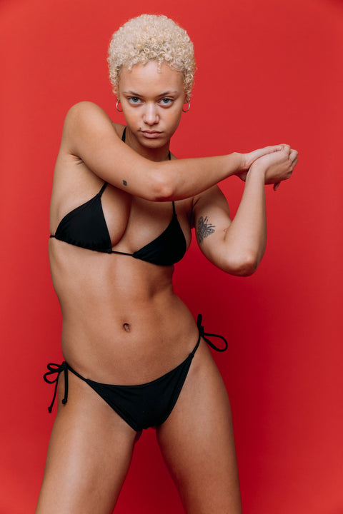 Basic Swim Black Flex Bikini Set on model with contrasting color backdrop